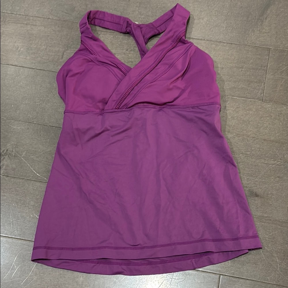 lululemon Purple tank no tags, includes pads, I believe size 6.  Good condition